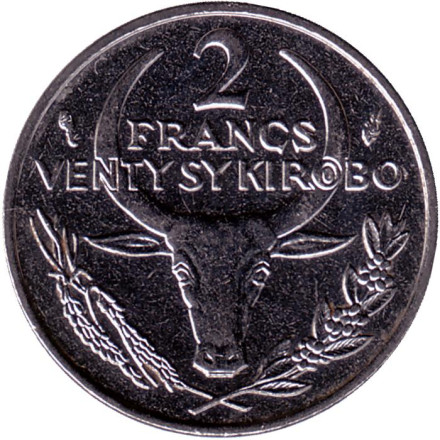 Монета 2 франка. 1982 год, Мадагаскар. Буйвол. Пуансеттия.
