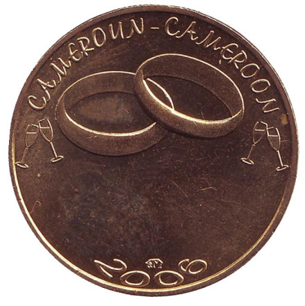 Монета 7500 франков. 2006 год, Камерун. Свадьба. Обручальные кольца.