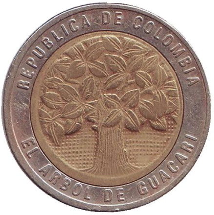 Монета 500 песо. 1995 год, Колумбия. Цветущее дерево гуакари.