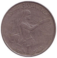 Монета 1 динар. 1976 год, Тунис. FAO. Женщина, собирающая урожай. Монета 1 динар. 1976 год, Тунис. FAO. Женщина, собирающая урожай.