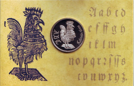 Монета 1 лат в буклете, 2010 год, Латвия. Петух. Латышская азбука.