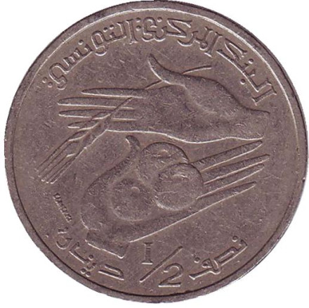 Монета 1/2 динара. 2009 год, Тунис.