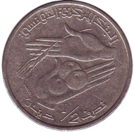 Монета 1/2 динара. 2013 год, Тунис. Монета 1/2 динара. 2013 год, Тунис.