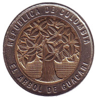 Монета 500 песо. 2008 год, Колумбия. Цветущее дерево гуакари. Монета 500 песо. 2008 год, Колумбия. Цветущее дерево гуакари.