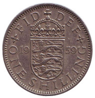 Монета 1 шиллинг. 1959 год, Великобритания. (Герб Англии).