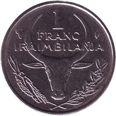 Монета 1 франк. 1987 год, Мадагаскар. Буйвол. Пуансеттия.