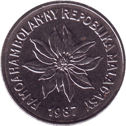 Монета 1 франк. 1987 год, Мадагаскар. Буйвол. Пуансеттия. Монета 1 франк. 1987 год, Мадагаскар. Буйвол. Пуансеттия.