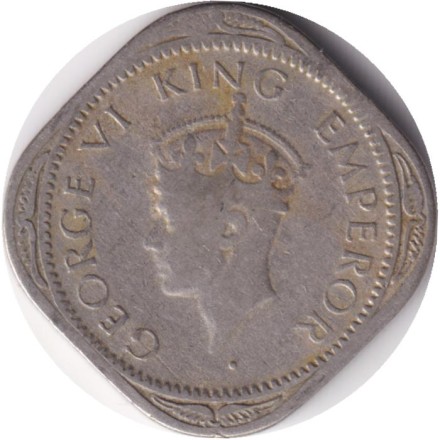 Монета 1/2 анны. 1946 год, Индия Британская. (Черточки без точки перед и после даты). Монета 1/2 анны. 1946 год, Индия Британская. (Черточки без точки перед и после даты).