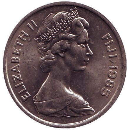 Монета 20 центов. 1985 год, Фиджи. Культовый атрибут Tabua (зуб кита) на плетеном шнурке.