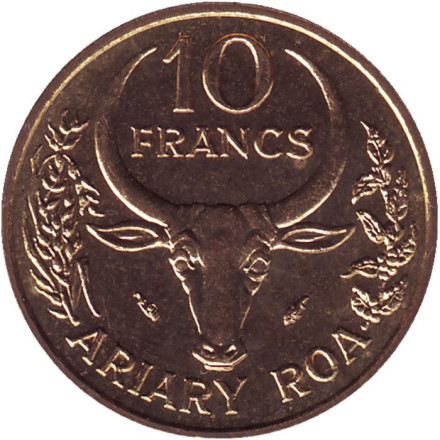 Монета 10 франков. 1984 год, Мадагаскар. Буйвол. Стручки ванили.