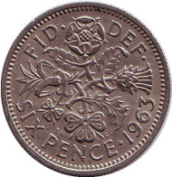 Монета 6 пенсов. 1963 год, Великобритания. Флора: лук-порей, роза, чертополох и трилистник.