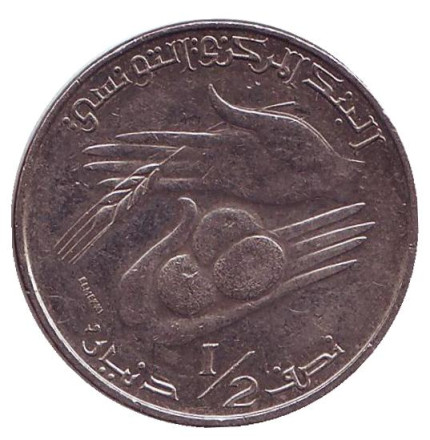 Монета 1/2 динара. 1983 год, Тунис.