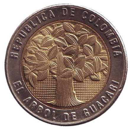 Монета 500 песо. 2009 год, Колумбия. Цветущее дерево гуакари.