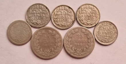 Подборка из 7-и монет номиналами 10 и 25 центов. 1897-1944 гг., Нидерланды.
