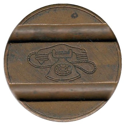 Телефонный жетон. 7203. Италия. 1972 год. (Отметка: IPM) Телефонный жетон. 7203. Италия. 1972 год. (Отметка: IPM)