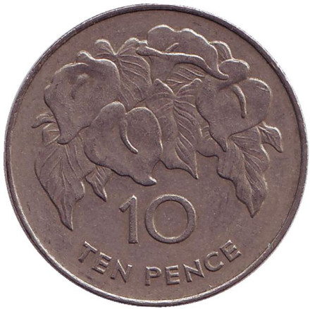 Монета 10 пенсов. 1984 год, Острова Святой Елены и Вознесения. Белая лилия.