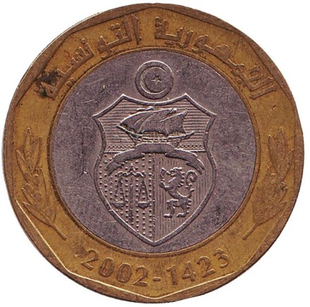 Монета 5 динаров. 2002 год, Тунис. (Гладкие звезды) Хабиб Бен Али Бургира. Монета 5 динаров. 2002 год, Тунис. (Гладкие звезды) Хабиб Бен Али Бургира.