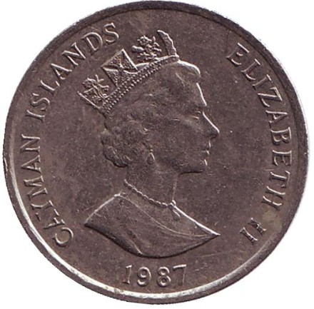 Монета 25 центов. 1987 год, Каймановы острова. Парусник.