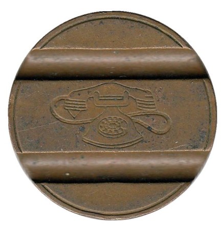 Телефонный жетон. 7405. Италия. 1974 год. (Отметка: IPM) Телефонный жетон. 7405. Италия. 1974 год. (Отметка: IPM)