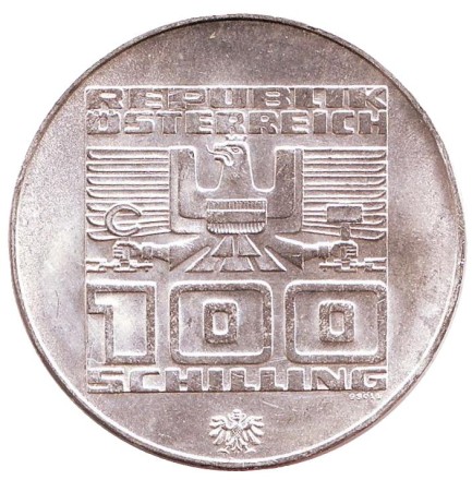 Монета 100 шиллингов. 1975 год, Австрия. XII зимние Олимпийские Игры. Инсбрук 1976. Здание и Олимпийская эмблема. (Отметка - орёл). BU. Монета 100 шиллингов. 1975 год, Австрия. XII зимние Олимпийские Игры. Инсбрук 1976. Здание и Олимпийская эмблема. (Отметка - орёл). BU.