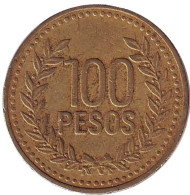 Монета 100 песо. 1994 год, Колумбия. (Большие цифры номинала) Монета 100 песо. 1994 год, Колумбия. (Большие цифры номинала)