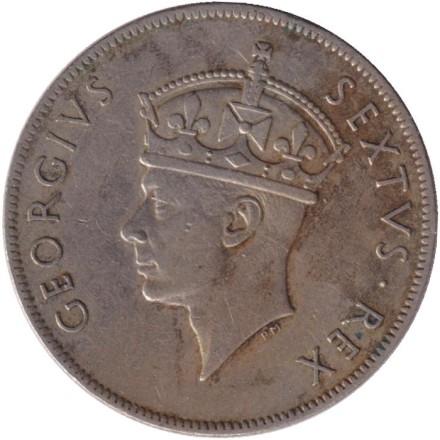 Монета 1 шиллинг. 1948 год, Восточная Африка. Лев. Монета 1 шиллинг. 1948 год, Восточная Африка. Лев.