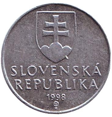 Монета 10 геллеров. 1998 год, Словакия. Деревянная колокольня.