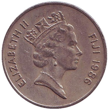 Монета 10 центов. 1986 год, Фиджи. Метательная дубинка - ула тава тава.