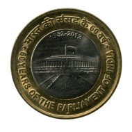 Монета 10 рупий. 2012 год, Индия. 60 лет Парламенту Индии. ("♦" - Мумбаи). Монета 10 рупий. 2012 год, Индия. 60 лет Парламенту Индии. ("♦" - Мумбаи).