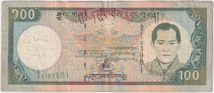 Банкнота 100 нгултрумов. 2000 год, Бутан. Монастырь Ташичо-дзонг.