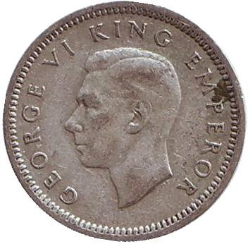 Монета 3 пенса. 1945 год, Новая Зеландия. Скрещенные вахаики.