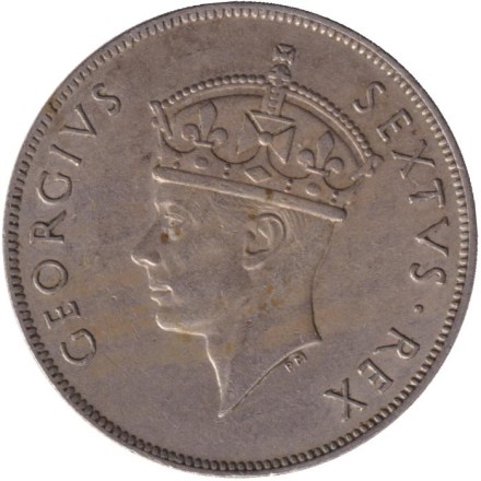 Монета 1 шиллинг. 1949 год, Восточная Африка. Лев. (Без отметки монетного двора). Монета 1 шиллинг. 1949 год, Восточная Африка. Лев. (Без отметки монетного двора).