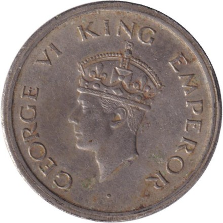 Монета 1 рупия. 1947 год, Индия Британская. Лев.("♦" - Бомбей).