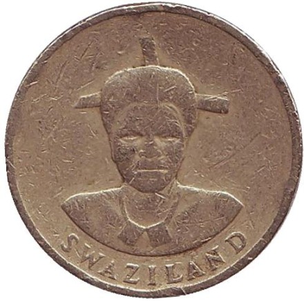 Монета 1 лилангени. 1986 год, Свазиленд. Король Мсавати III. Дзелигве Шонгве. Монета 1 лилангени. 1986 год, Свазиленд. Король Мсавати III. Дзелигве Шонгве.