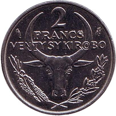 Монета 2 франка. 1988 год, Мадагаскар. Пуансеттия.