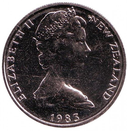 Монета 10 центов. 1983 год, Новая Зеландия. BU. Маска маори. Монета 10 центов. 1983 год, Новая Зеландия. BU. Маска маори.