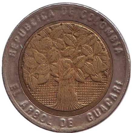 Монета 500 песо. 2007 год, Колумбия. Цветущее дерево гуакари.
