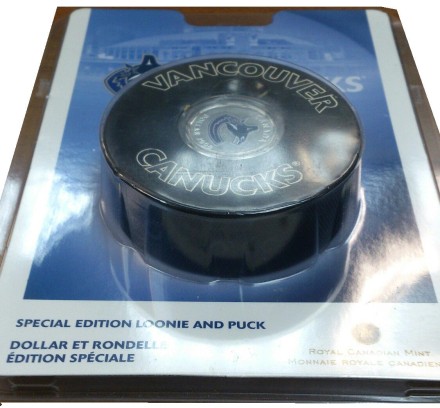 Монета 1 доллар. 2008 год, Канада. Хоккейный клуб "Ванкувер Кэнакс". (В шайбе).