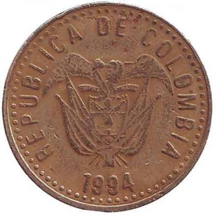 Монета 100 песо. 1994 год, Колумбия. (Маленькие цифры номинала) Монета 100 песо. 1994 год, Колумбия. (Маленькие цифры номинала)
