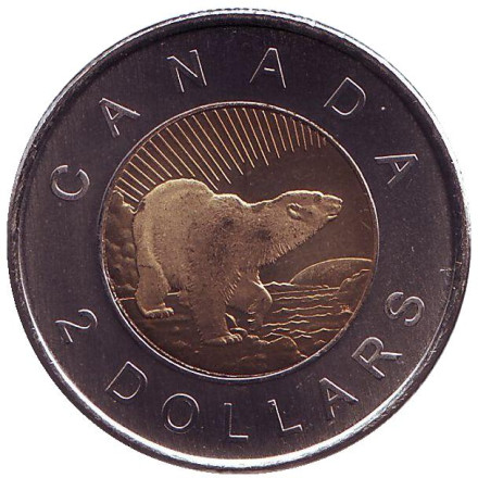 Монета 2 доллара. 2006 год, Канада. 10 лет с начала чекана монет номиналом 2 доллара. Полярный медведь.