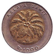 Монета 1000 рупий. 2000 год, Индонезия. Пальма. Монета 1000 рупий. 2000 год, Индонезия. Пальма.