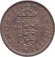 Монета 1 шиллинг. 1960 год, Великобритания. (Герб Англии). Монета 1 шиллинг. 1960 год, Великобритания. (Герб Англии).