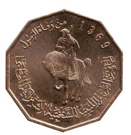 Монета 1/4 динара. 2001 год, Ливия. UNC. Всадник. Монета 1/4 динара. 2001 год, Ливия. UNC. Всадник.