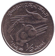 Монета 1/2 динара. 2007 год, Тунис. Монета 1/2 динара. 2007 год, Тунис.