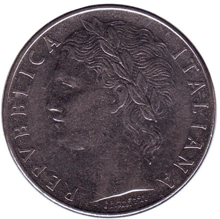 Монета 100 лир. 1977 год, Италия. Богиня мудрости Минерва рядом с оливковым деревом. Монета 100 лир. 1977 год, Италия. Богиня мудрости Минерва рядом с оливковым деревом.