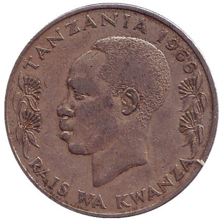Монета 1 шиллинг. 1966 год, Танзания. Из обращения. Президент Али Хассан Мвиньи. Факел. Монета 1 шиллинг. 1966 год, Танзания. Из обращения. Президент Али Хассан Мвиньи. Факел.