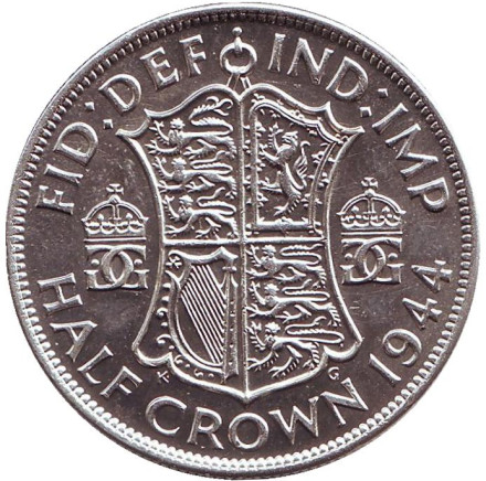 Монета 1/2 кроны. 1944 год, Великобритания.