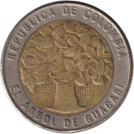 Монета 500 песо. 2011 год, Колумбия. Цветущее дерево гуакари.