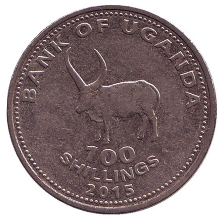 Монета 100 шиллингов. 2015 год, Уганда. Из обращения. Африканский бык.