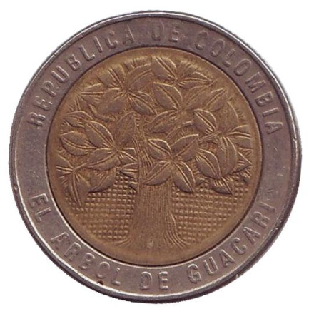 Монета 500 песо. 2002 год, Колумбия. Цветущее дерево гуакари.